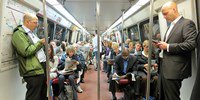 Commuters riding Metro