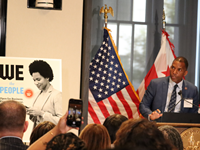 Lusk_speaks_at_a_podium_during_Talent_Capital_launch_event