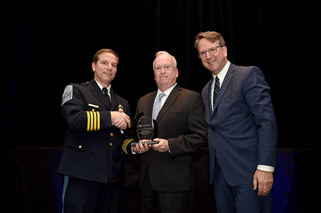 MWAA Police Chief David Huchler, WRAP President Kurt Erickson, and Chuck Bean.