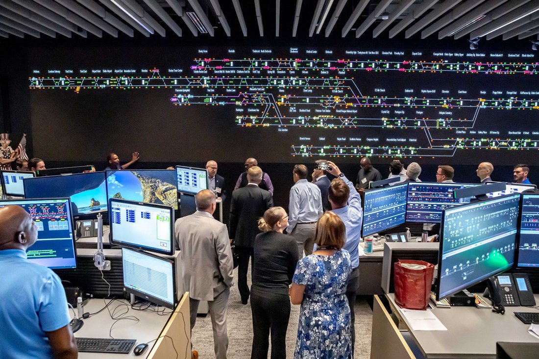 Tour participants view a large screen at Metro's Integrated Command and Communications Center.