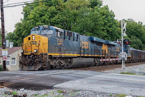 CSX train at Chestnut Street crossing in Gaithersburg, MD
