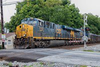 CSX train at Chestnut Street crossing in Gaithersburg, MD