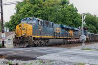 CSX train at Chestnut Street crossing in Gaithersburg, MD