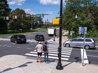 Pedestrians waiting to cross street in Arlington County